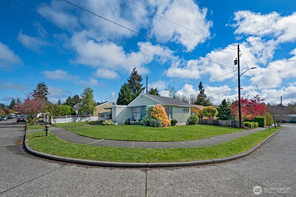 Photo of 9328 31st Avenue SW, Seattle, WA 98126 (MLS # 2491333)