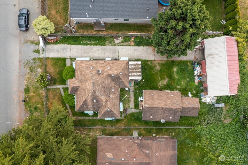 Photo of 10015 9th Avenue SW, Seattle, WA 98146 (MLS # 2075777)