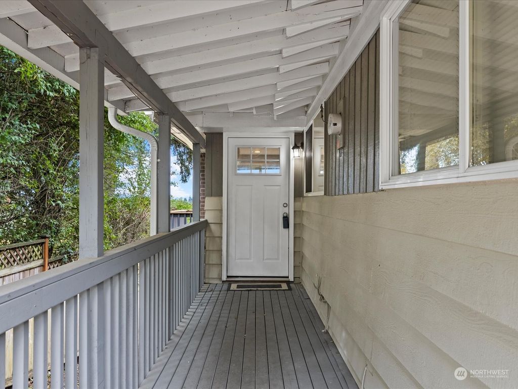 Photo of 10705 22nd Avenue SW, Seattle, WA 98146 (MLS # 2165470)