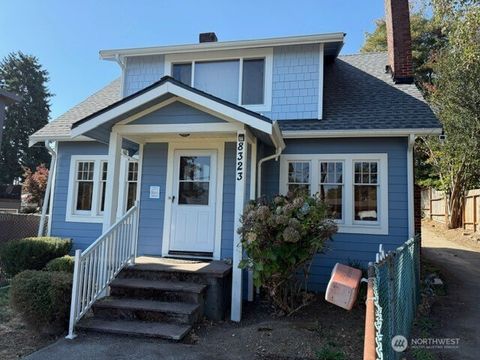 Photo of 8323 39th Avenue S, Seattle, WA 98118 (MLS # 2436911)