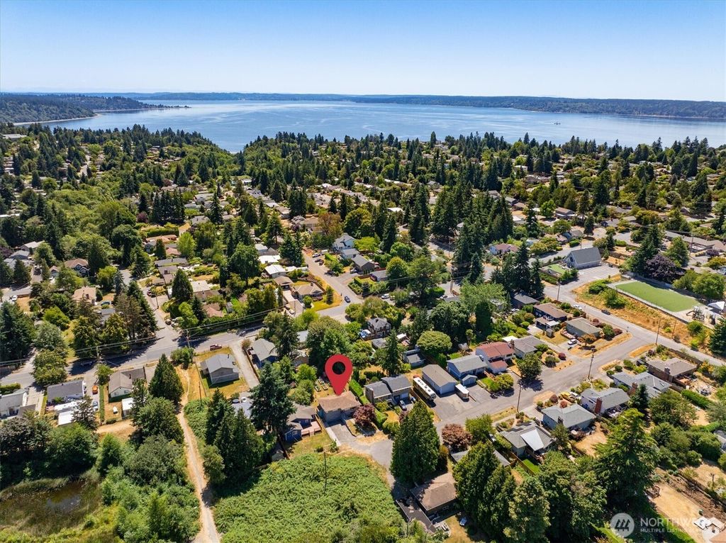 Photo of 3015 SW 105th Street, Seattle, WA 98146 (MLS # 2403818)