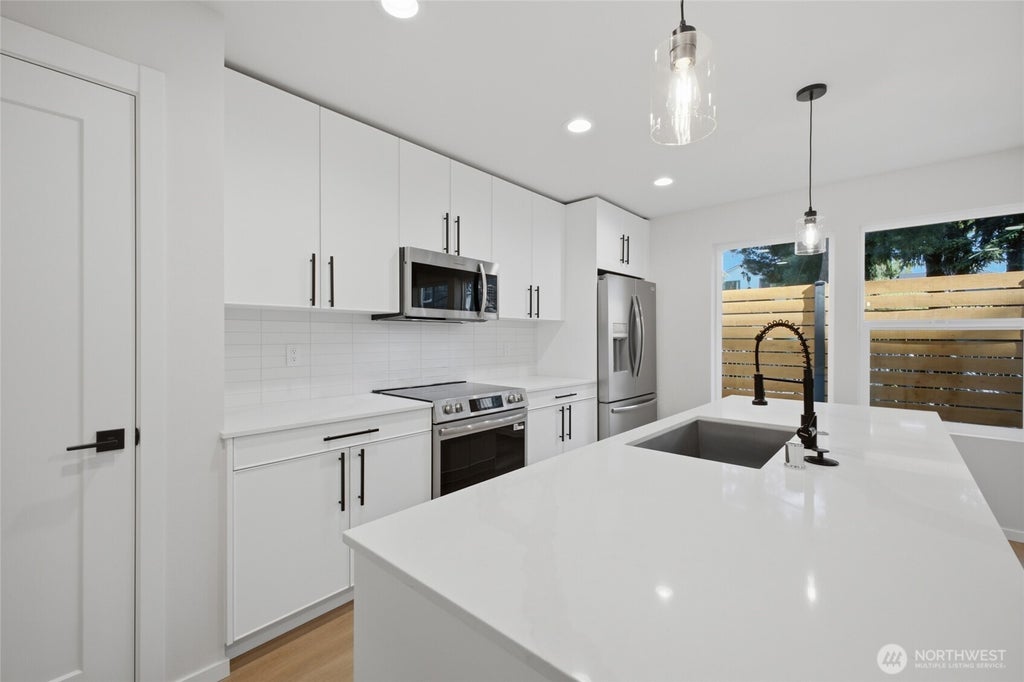 Photo of 9811 Linden Avenue N, Seattle, WA 98103 (MLS # 2555374)