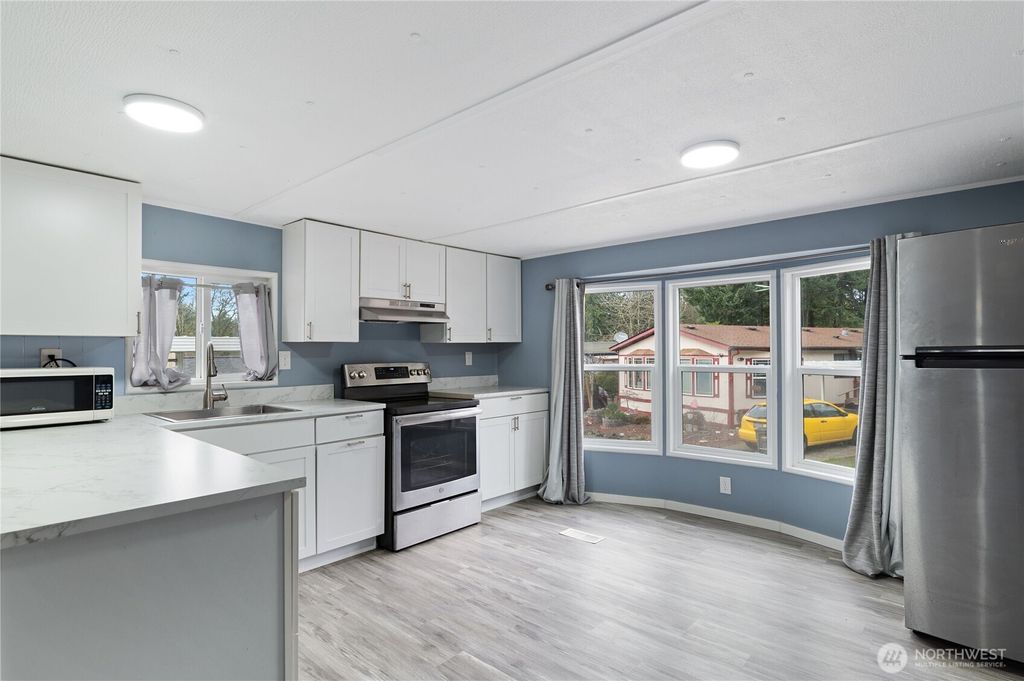 Photo of 3060 NE McWilliams Road #122, Bremerton, WA 98311 (MLS # 2472278)