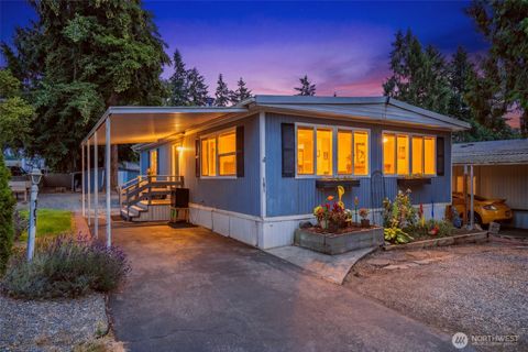 Photo of 7301 NE 175th Street #101, Kenmore, WA 98028 (MLS # 2558196)