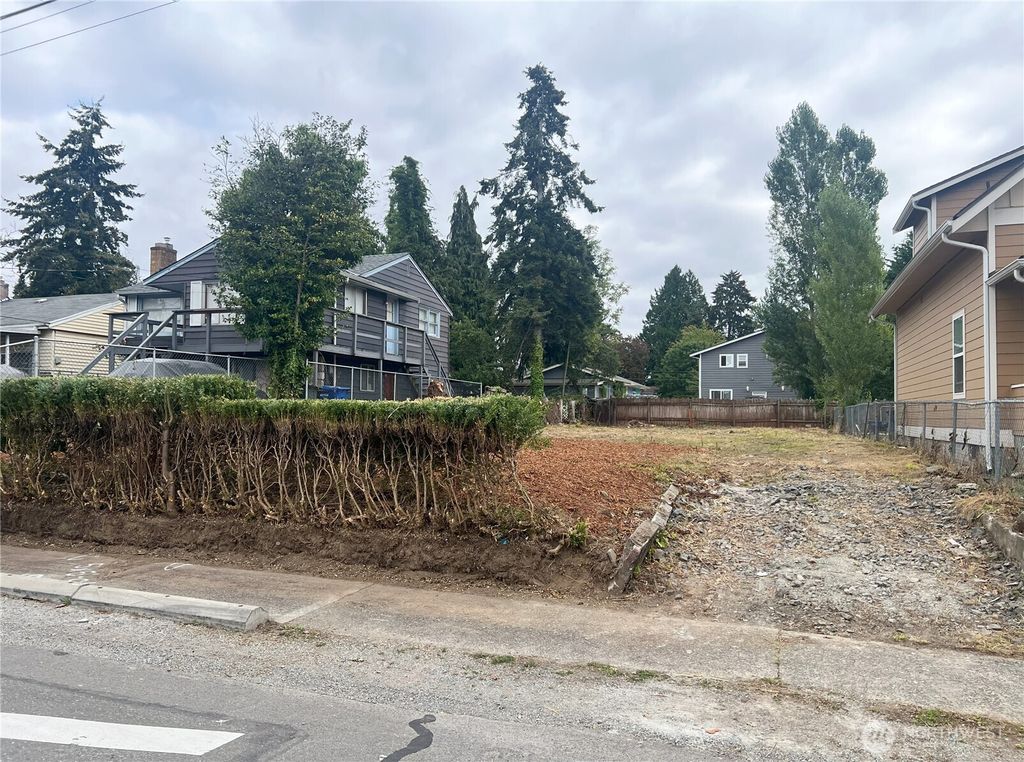 Photo of 8444 46th Avenue S, Seattle, WA 98118 (MLS # 2405899)