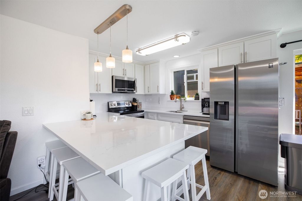 Photo of 12802 SE 202 Place, Kent, WA 98031 (MLS # 2498651)