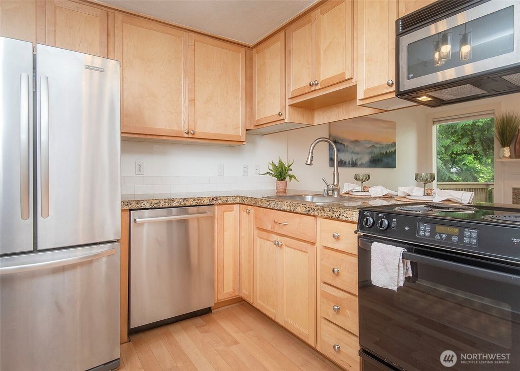 Photo of 301 W Raye Street #105, Seattle, WA 98119 (MLS # 2435478)