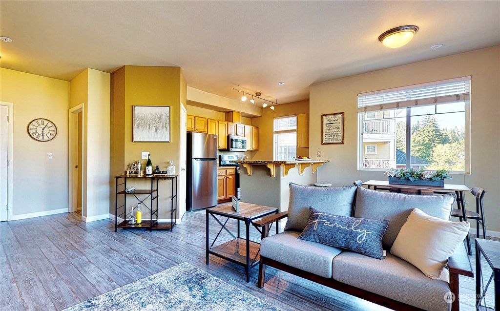 Photo of 517 225th Lane NE #E-206, Sammamish, WA 98074 (MLS # 2029906)
