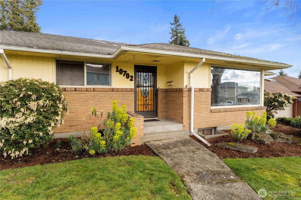 Photo of 10702 39th Avenue SW, Seattle, WA 98146 (MLS # 2501111)