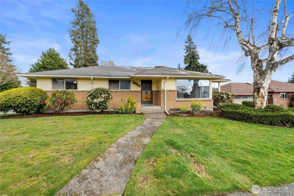 Photo of 10702 39th Avenue SW, Seattle, WA 98146 (MLS # 2501111)