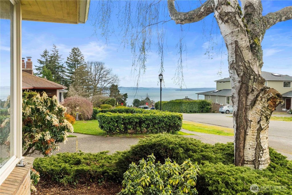 Photo of 10702 39th Avenue SW, Seattle, WA 98146 (MLS # 2501111)