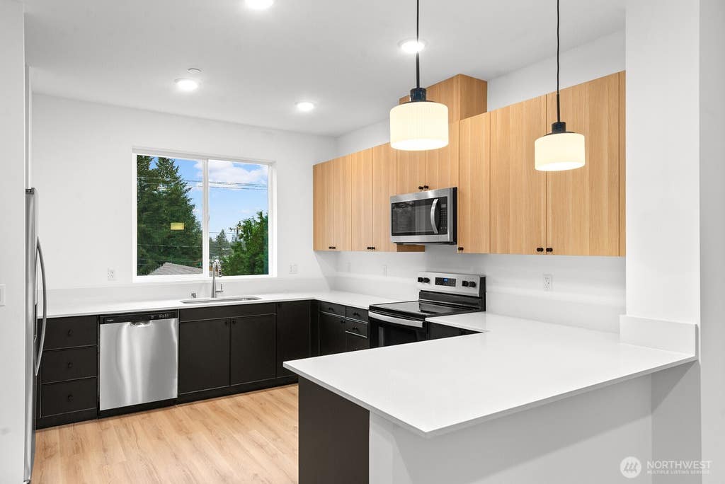 Photo of 1411 SW 111th Lane, Seattle, WA 98164 (MLS # 2570245)