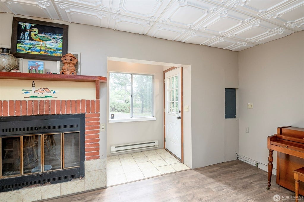 Photo of 1207 E Madrona Boulevard NW, Lakebay, WA 98349 (MLS # 2598378)