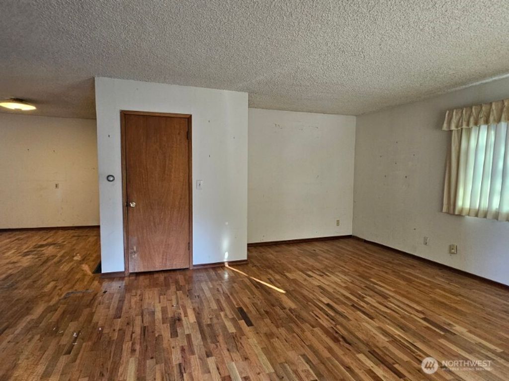 Photo of 14314 27th Avenue NE, Seattle, WA 98125 (MLS # 2434817)