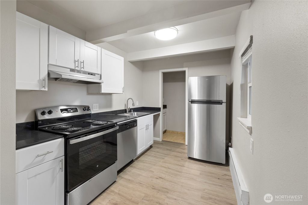 Photo of 4811 S 252nd Place, Kent, WA 98032 (MLS # 2468343)