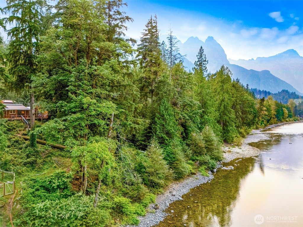 Photo of 52123 S Riverside Road, Gold Bar, WA 98251 (MLS # 2430652)