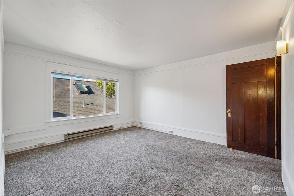 Photo of 1220 N 44th Ave St, Seattle, WA 98103 (MLS # 2469665)