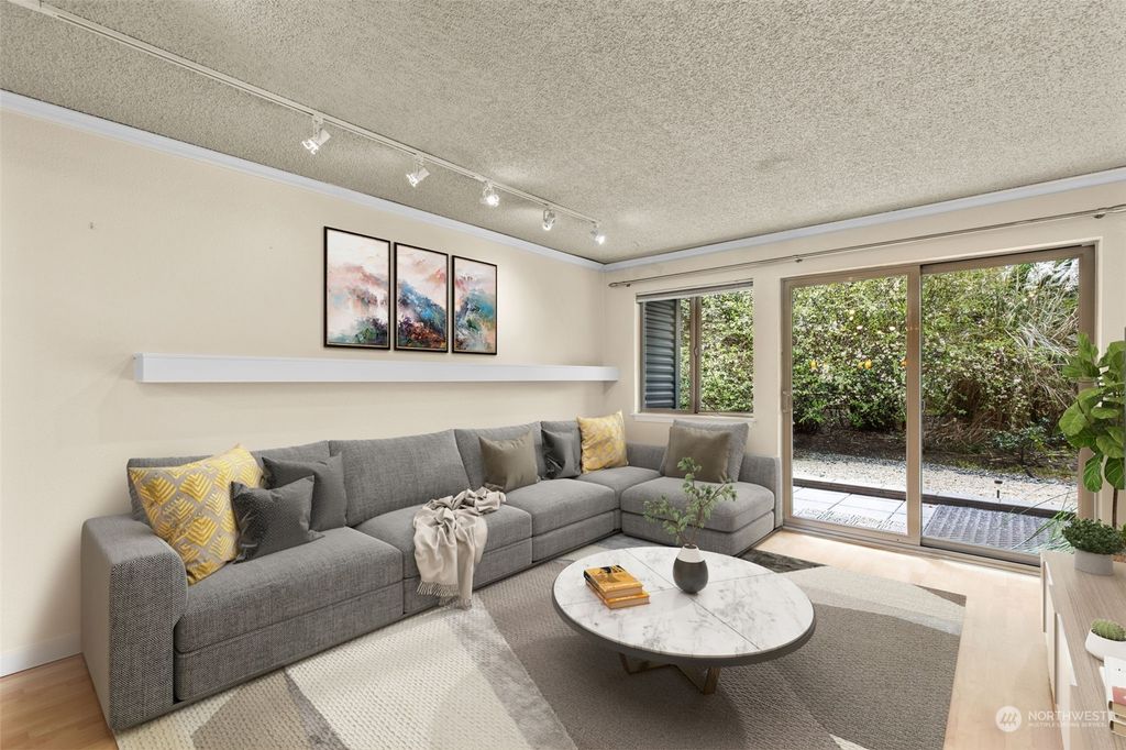 Photo of 275 W Roy St #107, Seattle, WA 98119 (MLS # 2052551)