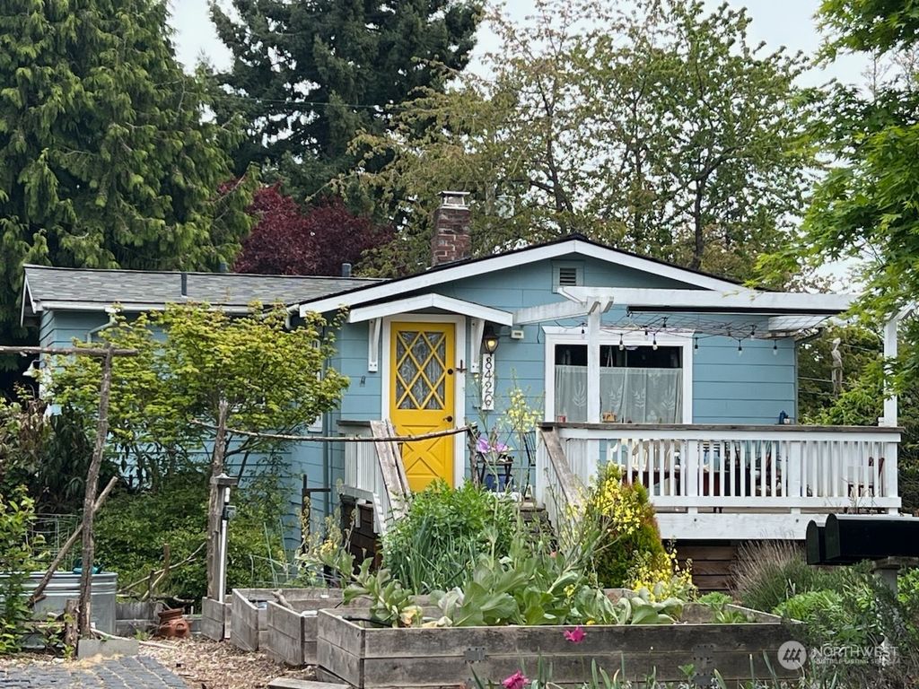 Photo of 8426 32nd Avenue SW, Seattle, WA 98126 (MLS # 2236156)