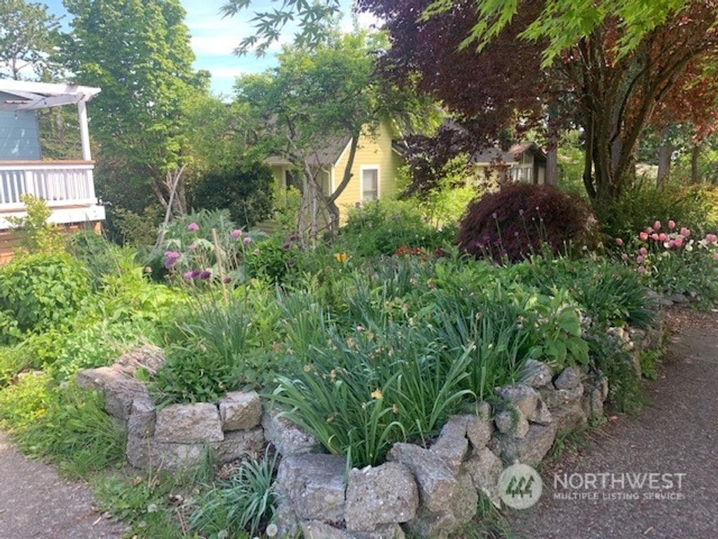 Photo of 8426 32nd Avenue SW, Seattle, WA 98126 (MLS # 2236156)