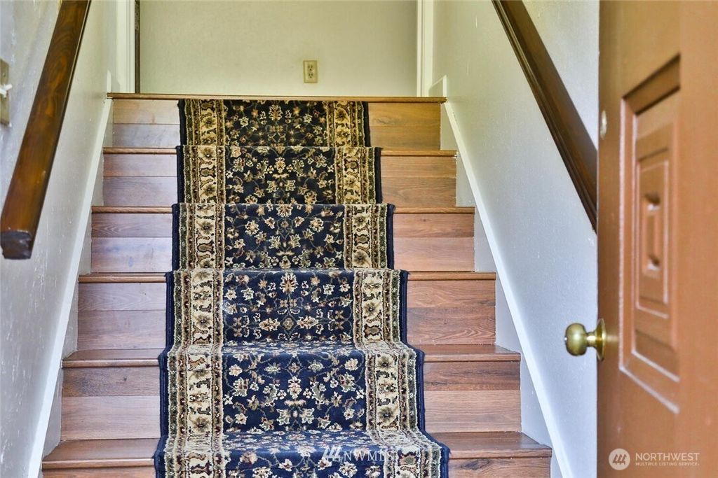 Photo of 4825 S Graham Street, Seattle, WA 98118 (MLS # 2426464)