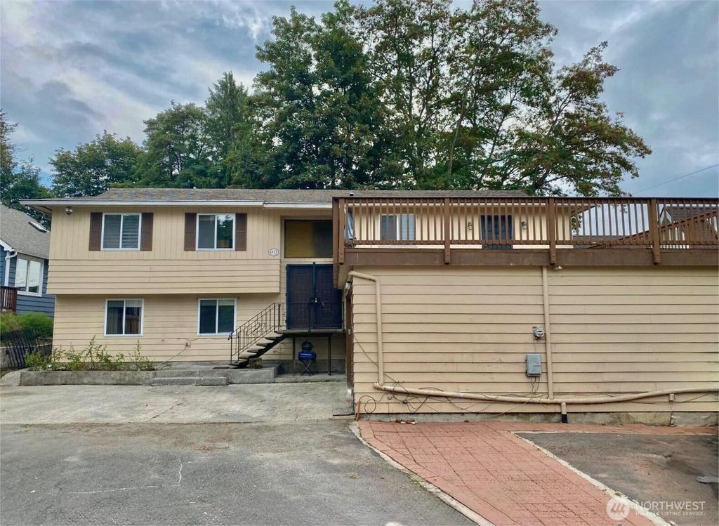 Photo of 4825 S Graham Street, Seattle, WA 98118 (MLS # 2426464)