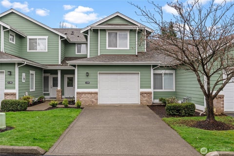 Photo of 10700 SE 260th Street #A103, Kent, WA 98030 (MLS # 2502657)