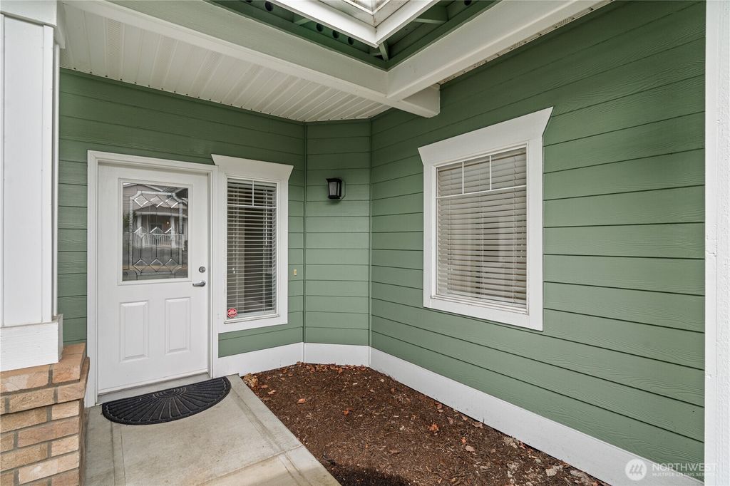 Photo of 10700 SE 260th Street #A103, Kent, WA 98030 (MLS # 2502657)