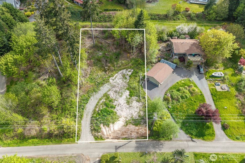 Photo of 9737 Glacis Drive NE, Olympia, WA 98516 (MLS # 2514419)