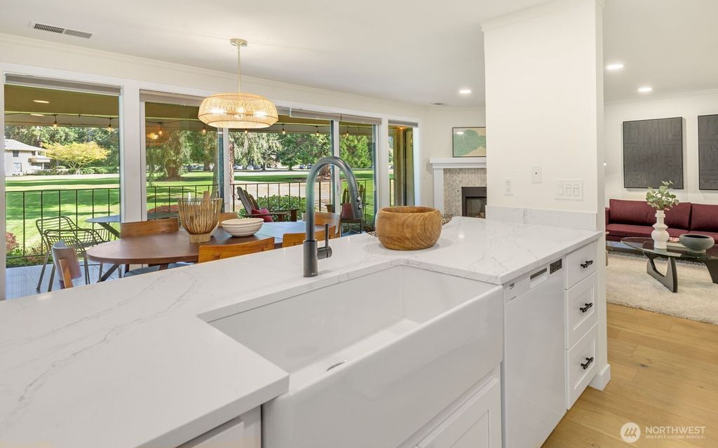 Photo of 16929 Inglewood Road NE #C104, Kenmore, WA 98028 (MLS # 2360885)
