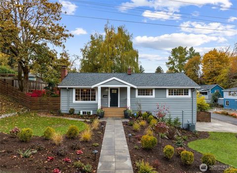 Photo of 4703 S Hudson Street, Seattle, WA 98118 (MLS # 2452802)