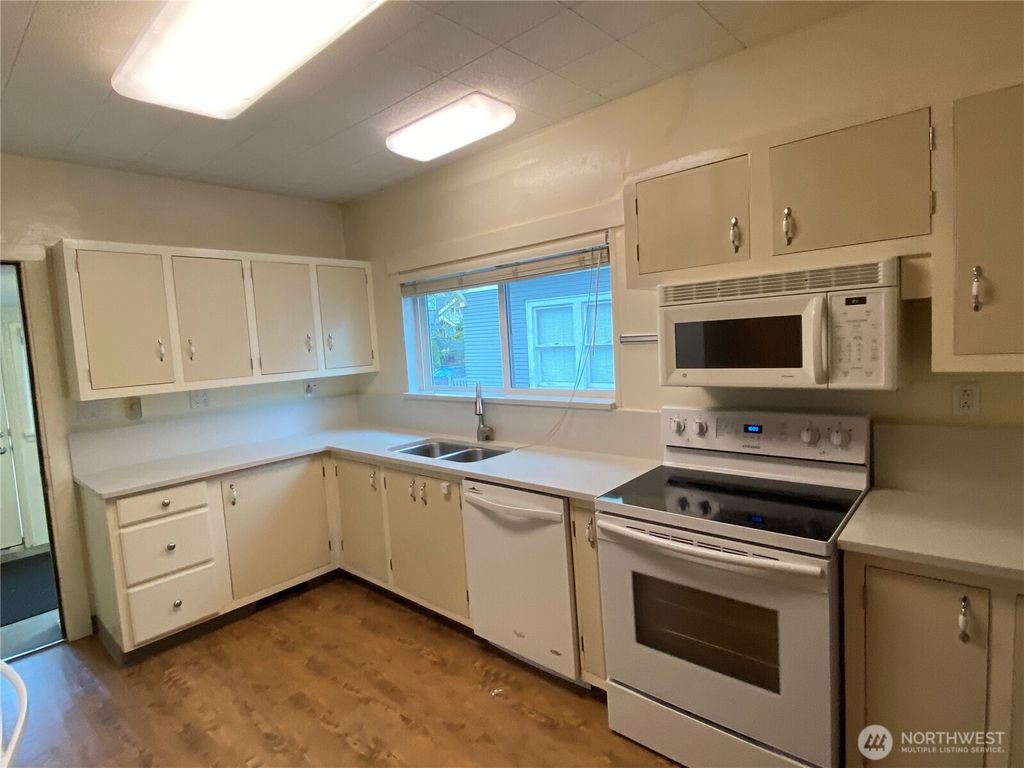 Photo of 809 NE 62nd Street, Seattle, WA 98115 (MLS # 2507424)