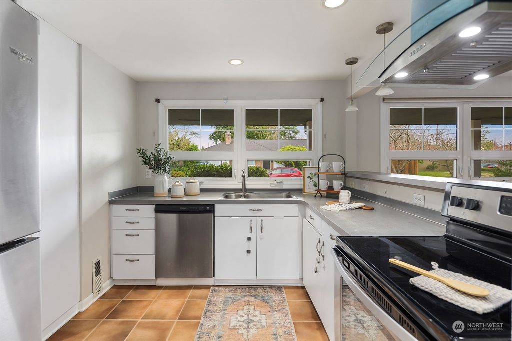 Photo of 8050 42nd Avenue NE, Seattle, WA 98115 (MLS # 2048429)