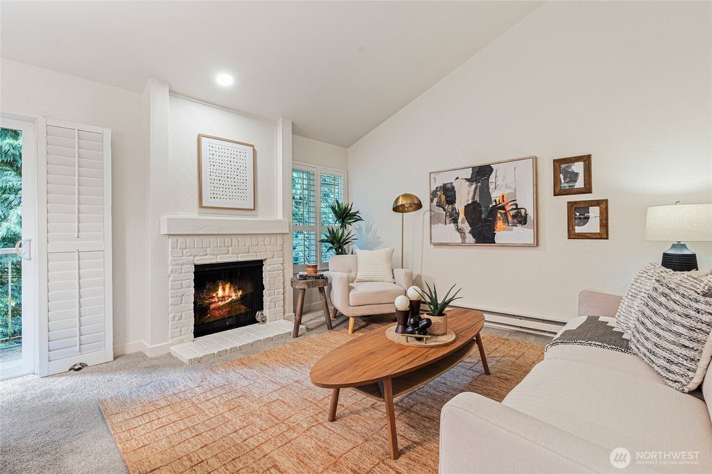 Photo of 14401 SE Petrovisky Road #C203, Renton, WA 98058 (MLS # 2354688)