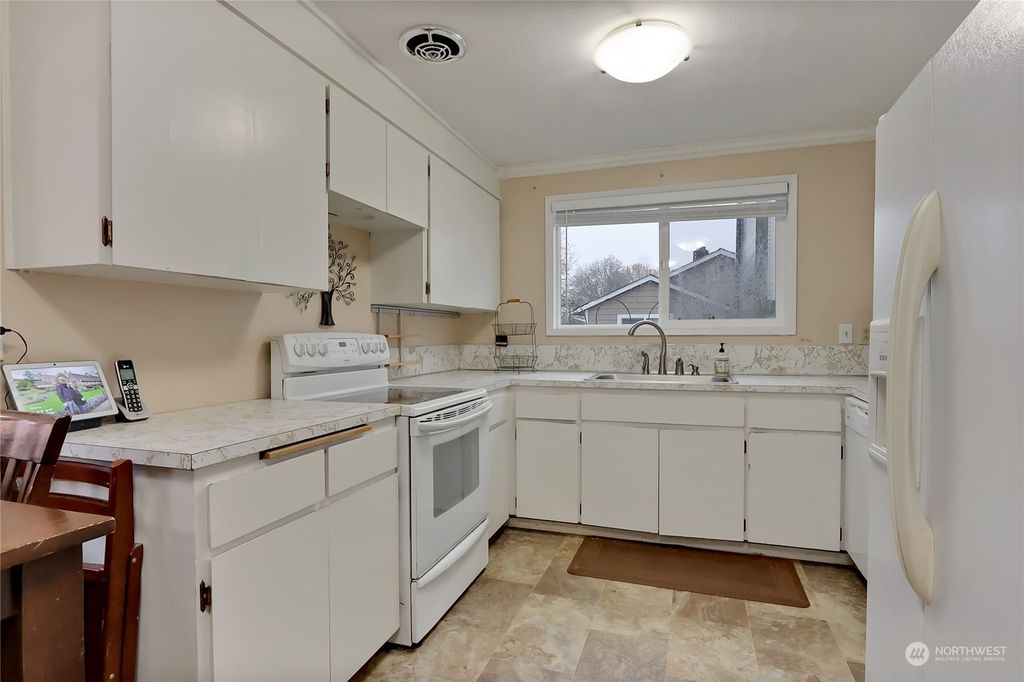 Photo of 10843 SE 173rd Street, Renton, WA 98055 (MLS # 2018958)