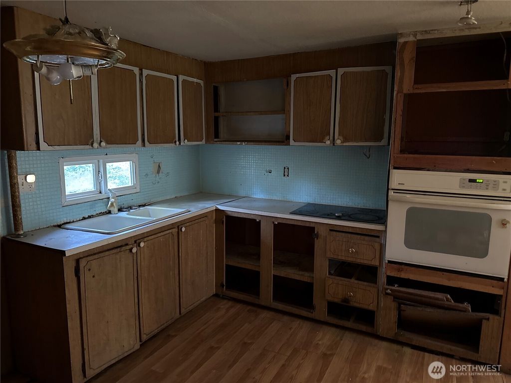 Photo of 1130 NE Larson Boulevard, Belfair, WA 98528 (MLS # 2480904)