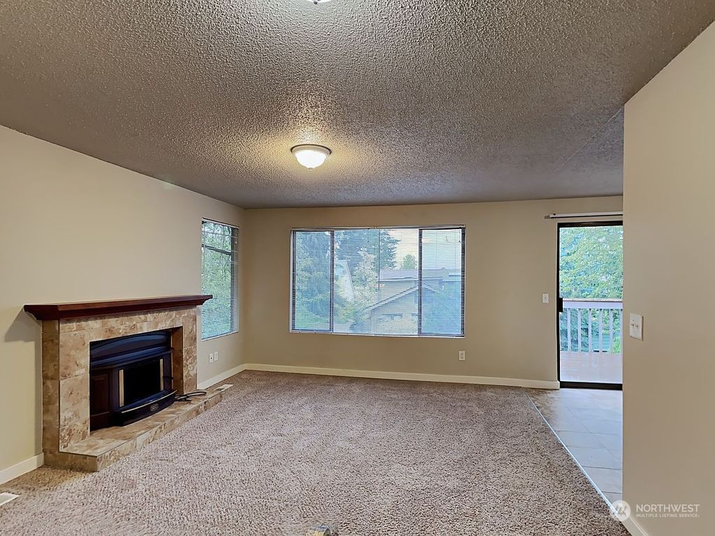 Photo of 6026 S Redwing Street, Seattle, WA 98118 (MLS # 2077183)