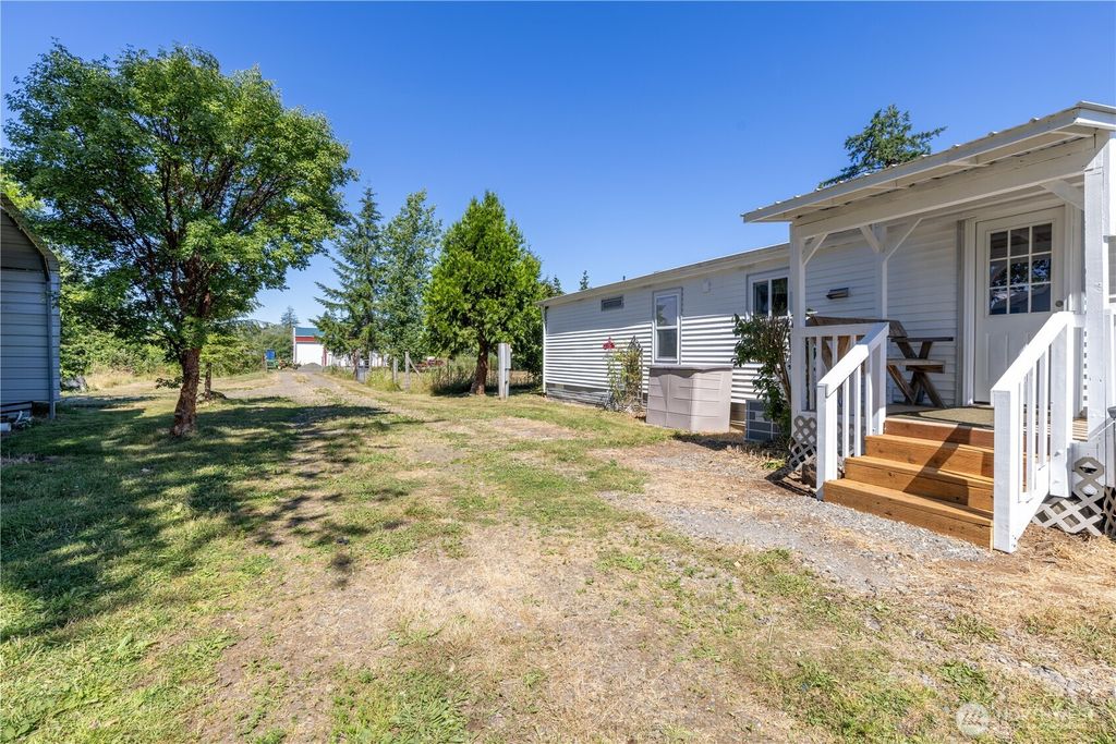 Photo of 71 W Doggone Lane, Elma, WA 98541 (MLS # 2500659)
