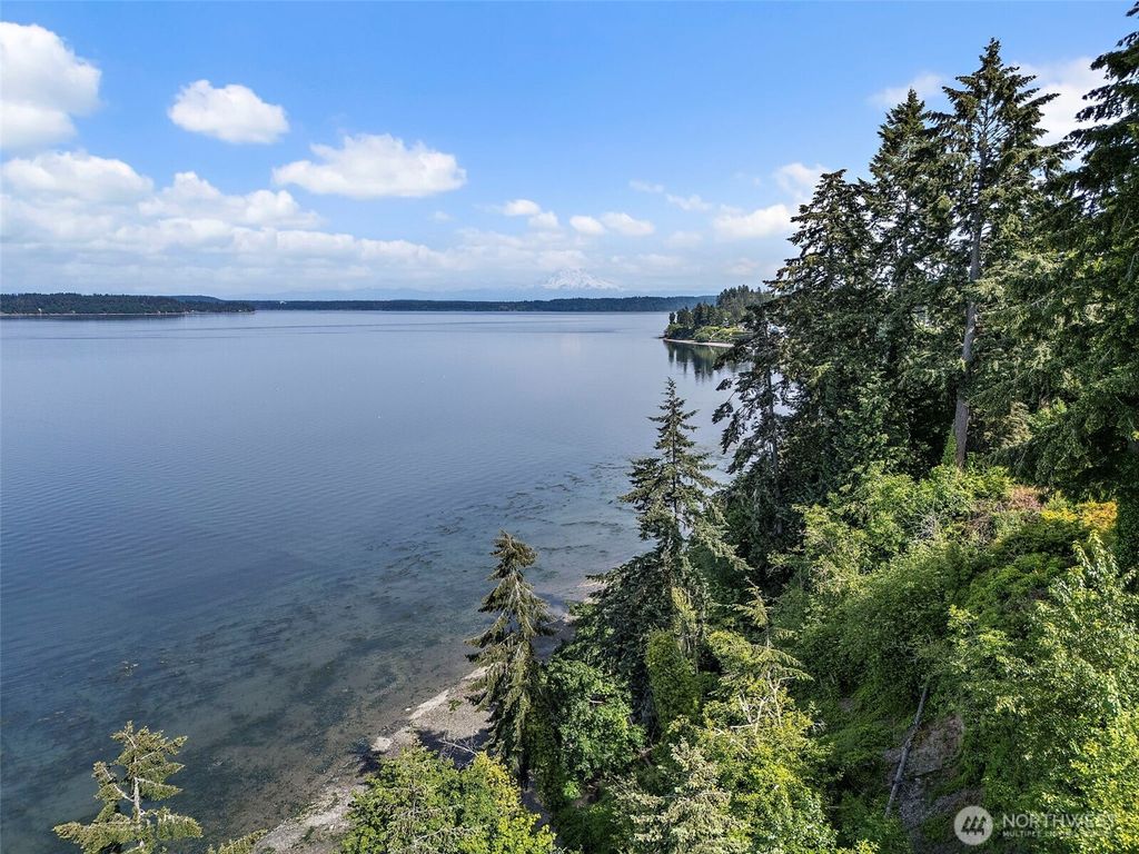 Photo of 7544 Sandy Point Beach Road NE, Olympia, WA 98516 (MLS # 2533967)