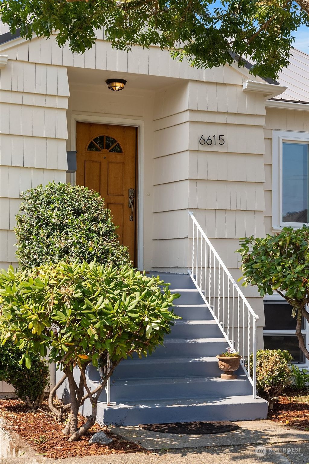 Photo of 6615 Flora Avenue S, Seattle, WA 98108 (MLS # 2156107)