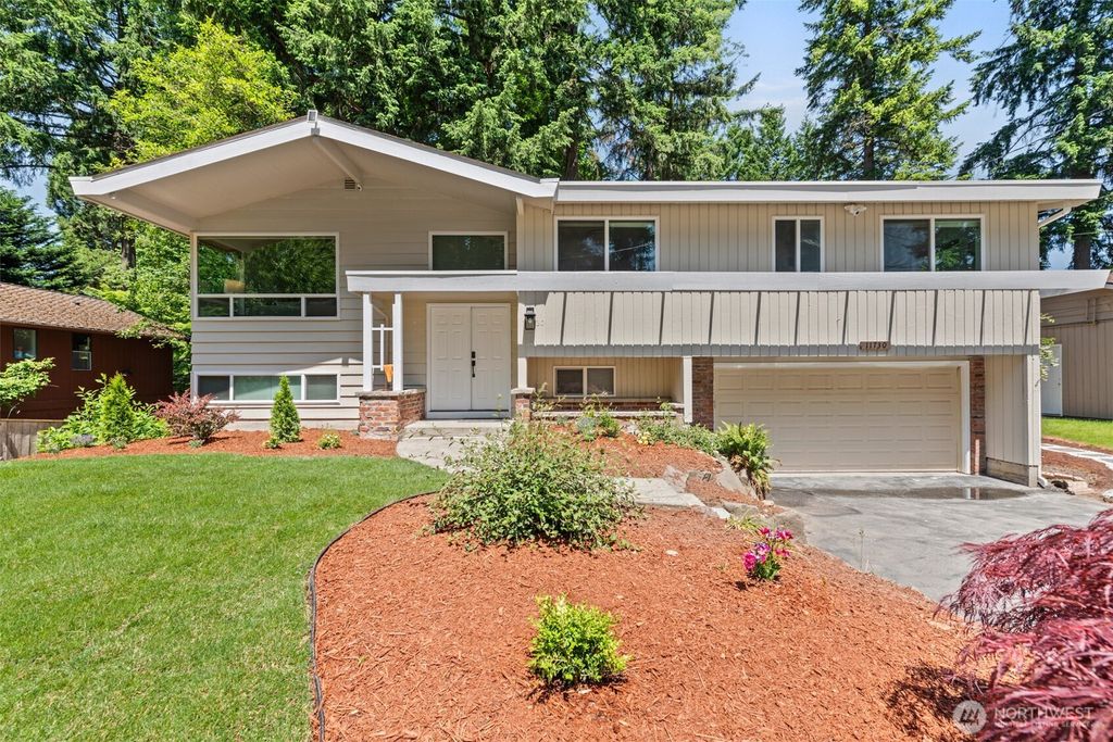 Photo of 11730 SE 52nd St St, Bellevue, WA 98006 (MLS # 2387633)