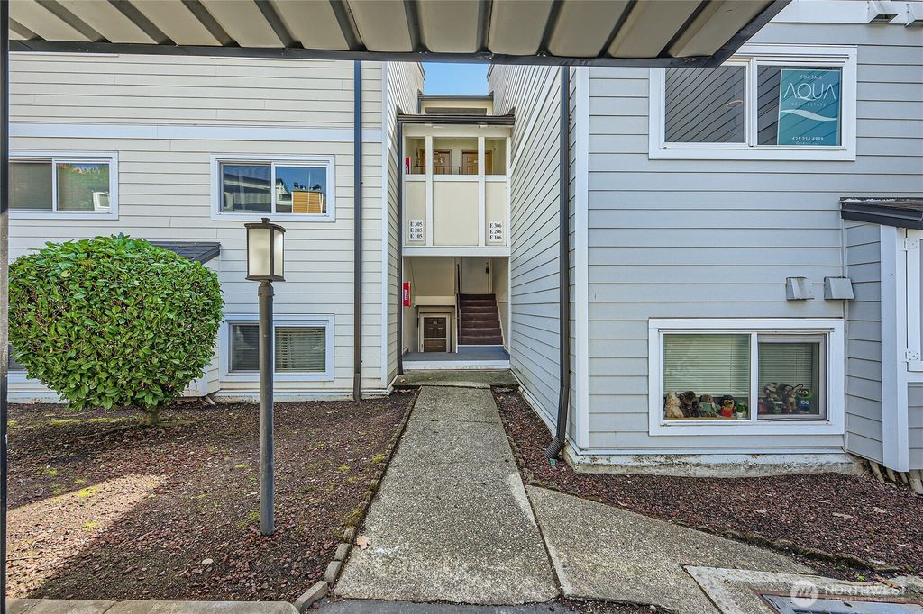 Photo of 15280 Macadam Road S #E205, Tukwila, WA 98188 (MLS # 2345791)