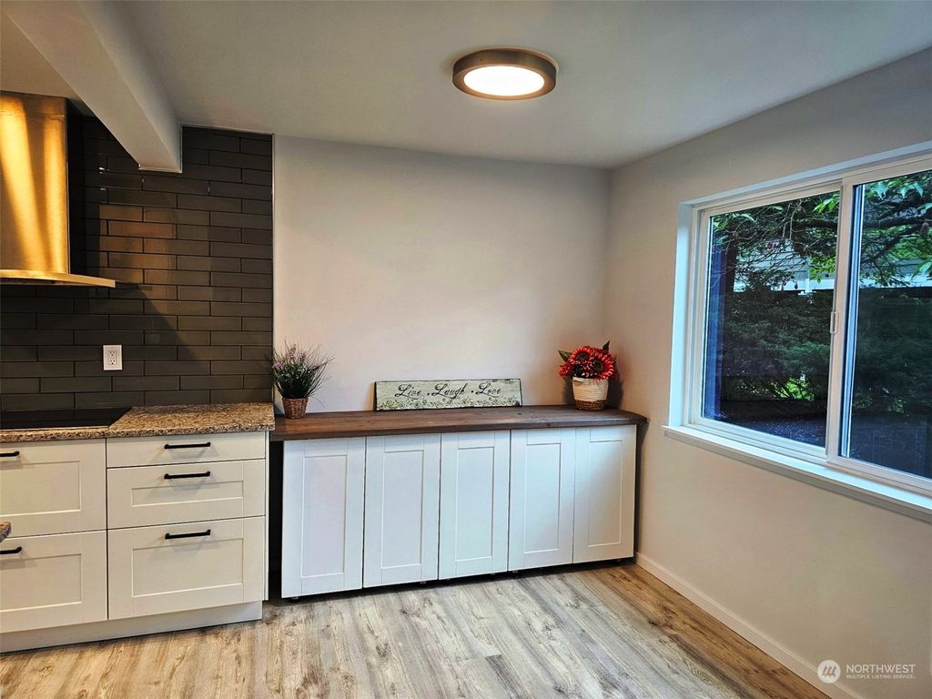 Photo of 12508 NE 142nd Lane #C-105, Kirkland, WA 98034 (MLS # 2294979)