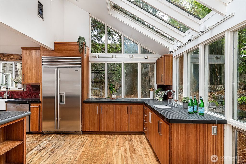 Photo of 9521 25th Avenue NW, Seattle, WA 98117 (MLS # 2443456)