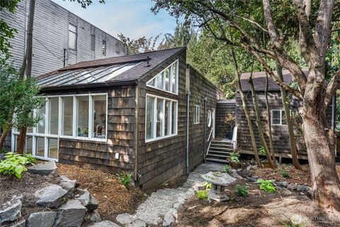Photo of 9521 25th Avenue NW, Seattle, WA 98117 (MLS # 2443456)