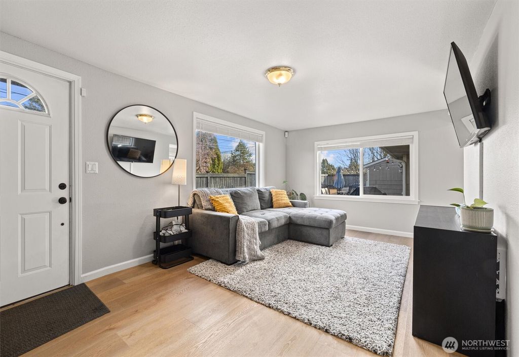 Photo of 1821 SW Kenyon Street, Seattle, WA 98106 (MLS # 2347315)