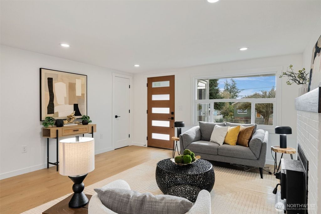 Photo of 704 N 104th Street, Seattle, WA 98133 (MLS # 2482844)