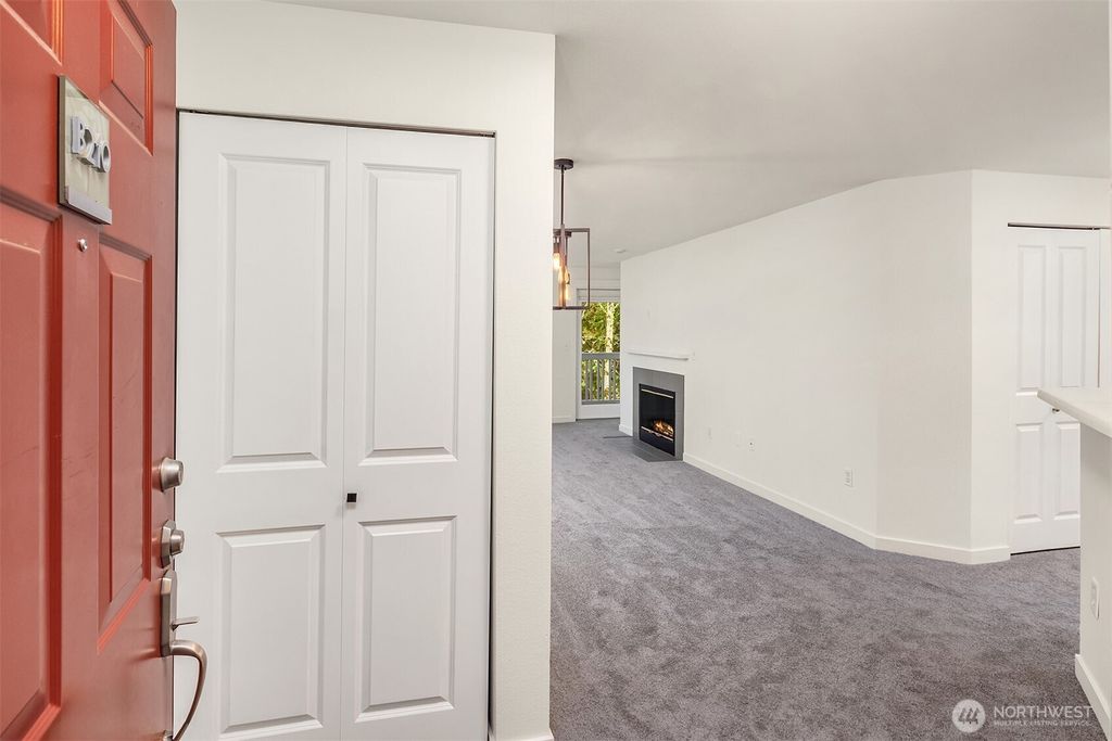 Photo of 7711 NE 175th Street #B210, Kenmore, WA 98028 (MLS # 2461065)