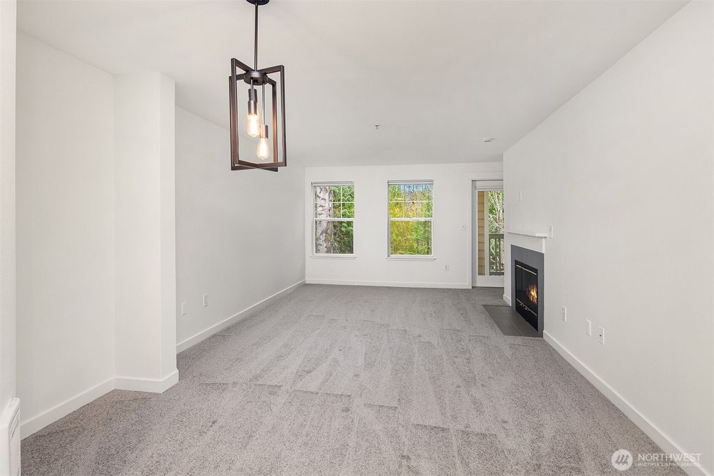 Photo of 7711 NE 175th Street #B210, Kenmore, WA 98028 (MLS # 2461065)