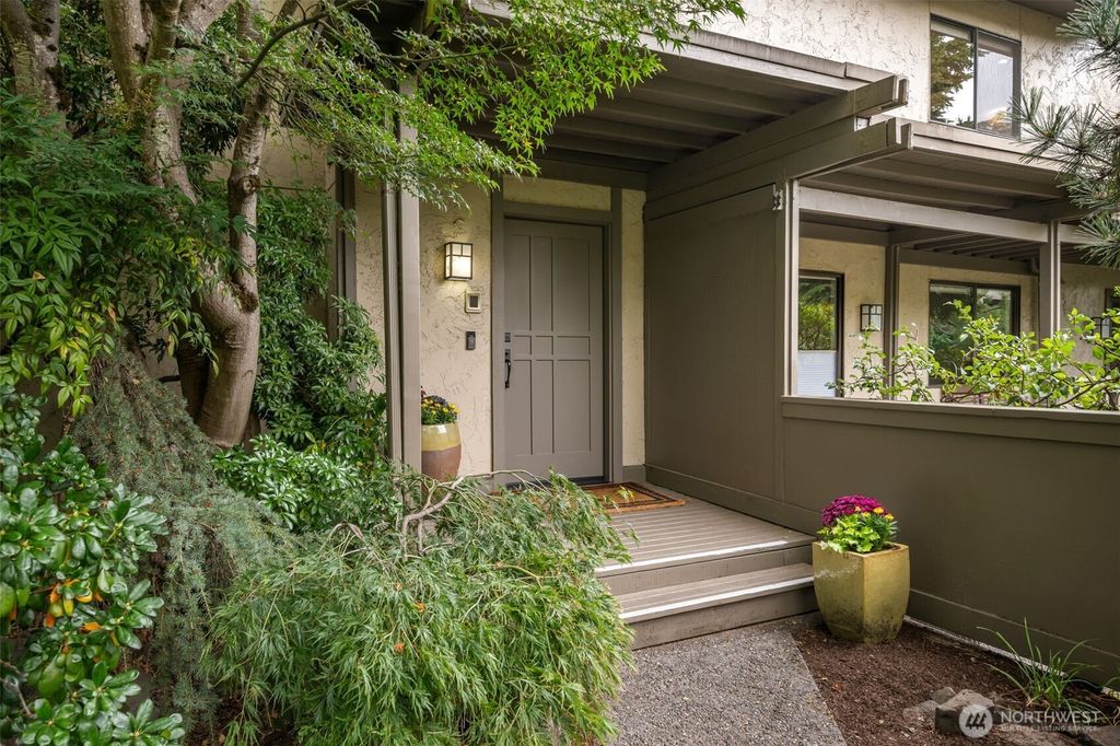 Photo of 6570 Park Point Way NE, Seattle, WA 98115 (MLS # 2433799)